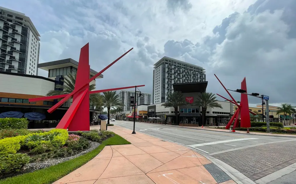 Downtown Doral, FL, with red sculptures and new towers